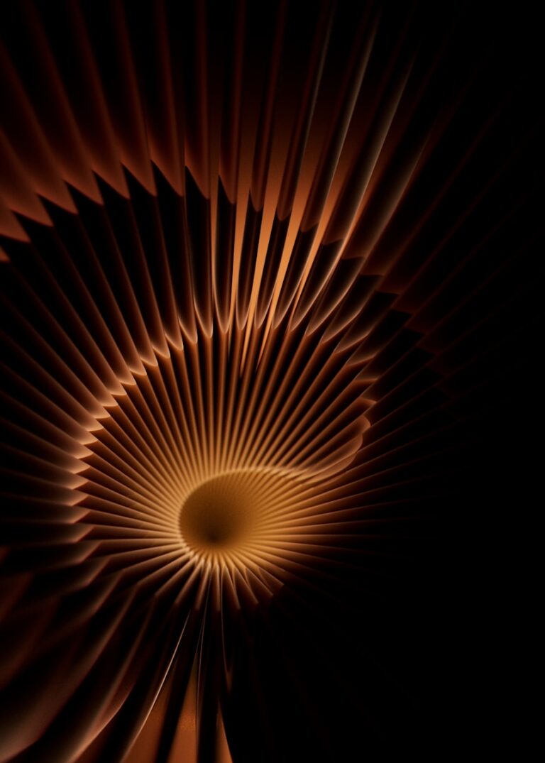 Abstract spiral pattern with warm light and shadow.