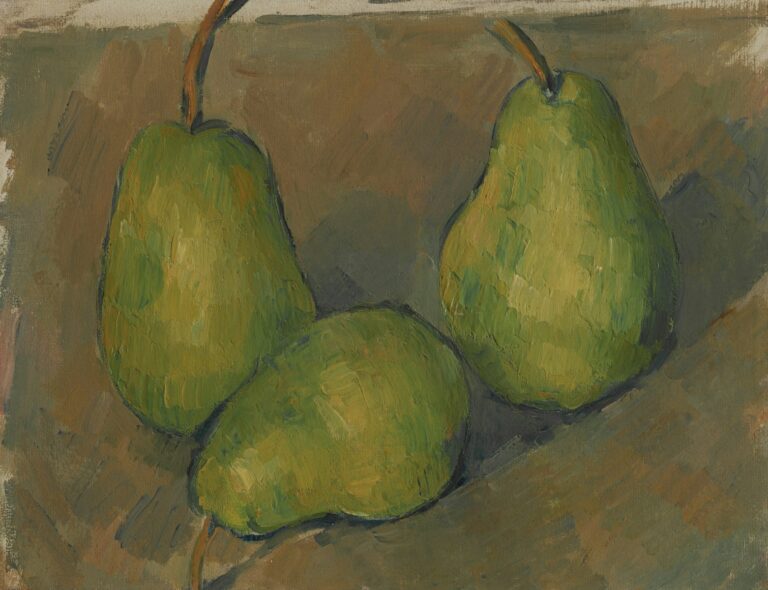 Three green pears on a brown surface